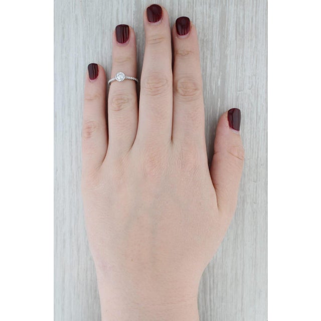 Metal 0.70ctw Round Bezel Set Diamond Engagement Ring 14k White Gold Size 4.5 For Sale - Image 7 of 8