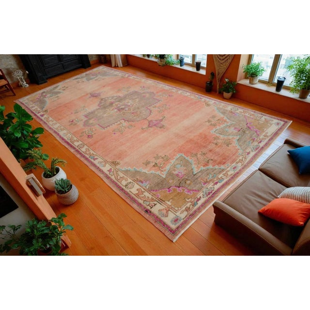 This exquisite vintage hand-woven Kars rug, originally crafted in the 1960s, is a stunning piece of Anatolian heritage....
