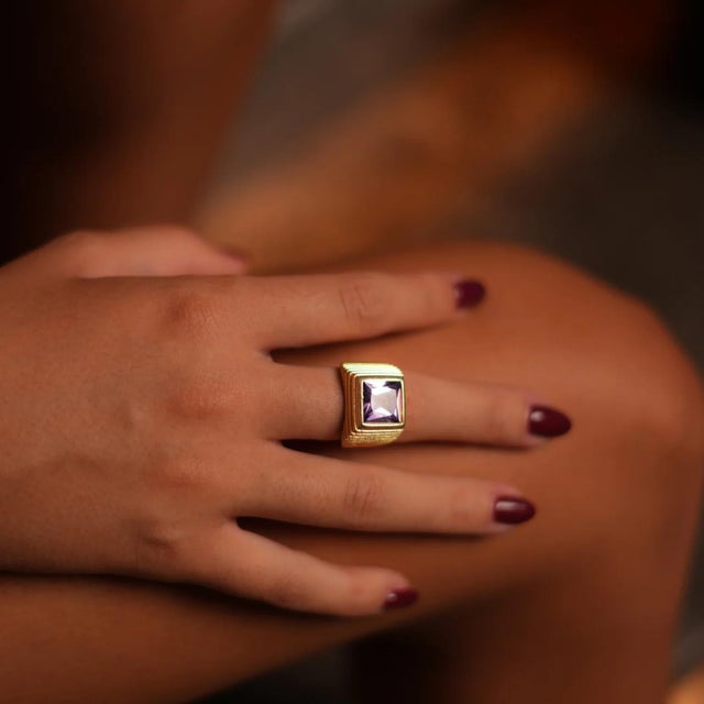 Majestic Amethyst & Gold Vermeil Chunky Signet Ring, designed to make a bold and luxurious statement. Featuring a wide and...