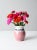 Handcrafted vintage studio pottery vase with a sculptural, bulbous silhouette and an artful presence. Finished in a soft...