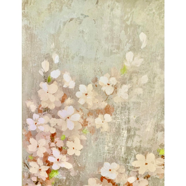 This lovely impressionistic painting of a cluster of cherry blossoms could easily be the centerpiece of a room. Its size,...