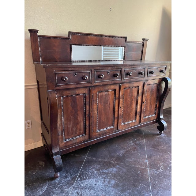 Sideboard inherited from Great Great Aunt. I've been told it's Civil War or before era. I don't know the wood, but it may...