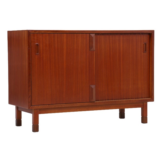 Mid-Century Mahogany Commode with Sliding Doors For Sale