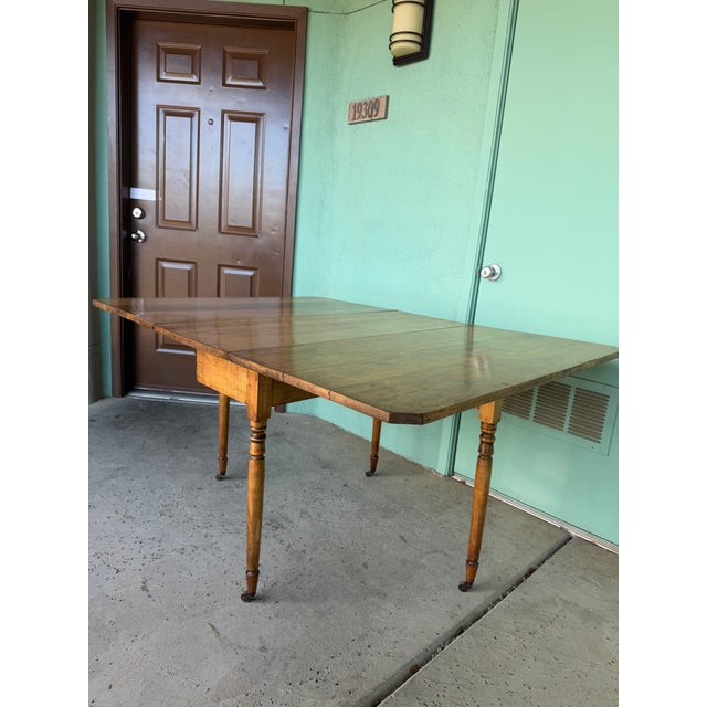 Early 19th Century Early Early American Drop Leaf Colonial Table From 1700s or 1800s. Turned Legs and Original Wood Casters, Good as Console or Kitchen Island or Dining. For Sale - Image 5 of 8