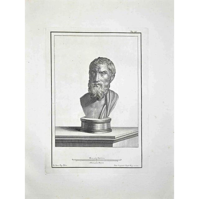 Ancient Roman Bust, from the series "Antiquities of Herculaneum Exposed", is an original etching realized by Francesco...