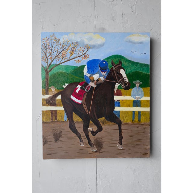 This vibrant vintage painting on wood depicts a racehorse and jockey in beautiful primary colors. The piece gives off a...