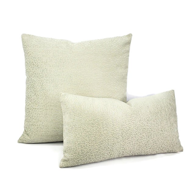 From Clarke and Clarke is Cesare in the color Duckegg pillow cover. This pillow features light blue almost gray chenille...