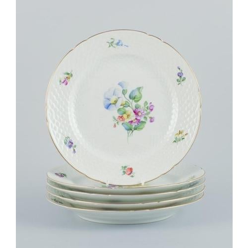 Bing & Grøndahl, Saxon Flower, a set of five dinner plates hand-decorated with polychrome flowers and gold rim....