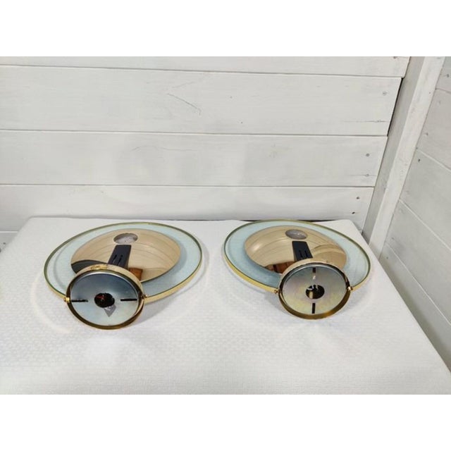 A superb and most stylish pair of sconces created in the 1970's in spain, by legendary italian designer leonardo marelli...