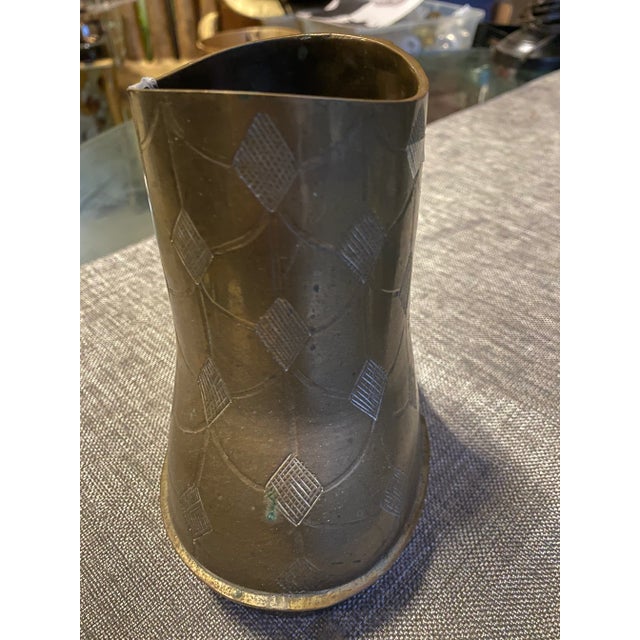 Beautiful brass boot vase in great vintage condition. Great decorative piece for the interior designer.