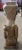 This is a 1974 Seated Male Wood Carving by Kimpembe Pierre (Mfuma, Nigeria). It measures 19" tall, 5 3/4" wide and 5 3/4"...