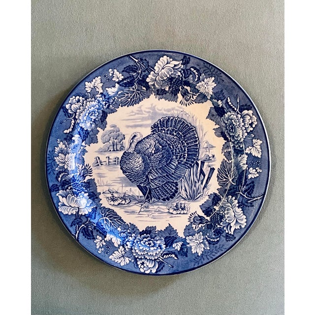 A classic rose bordered blue and white tranferware turkey centered plate. Ships within 1-2 days using USPS. All items...