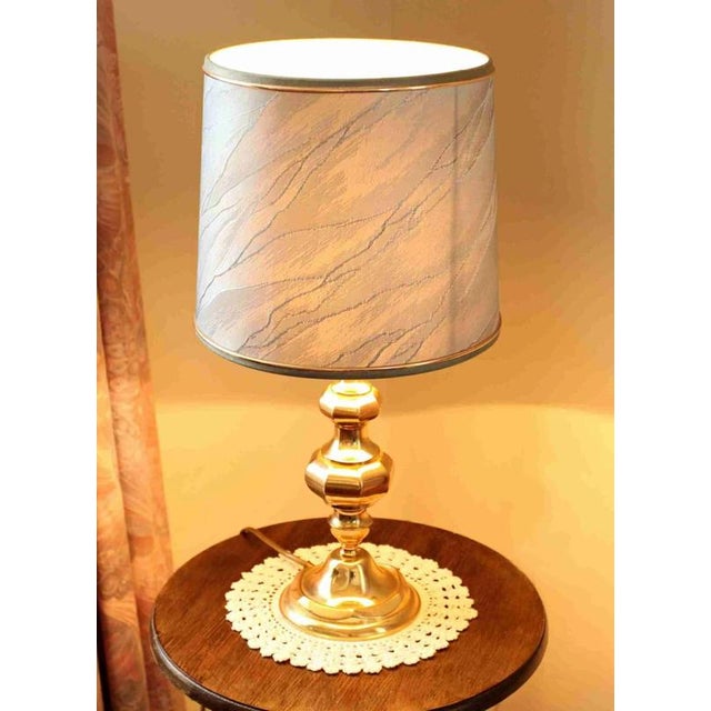 Heavy and stable. Excellent condition. New wiring. Original lampshade with decorative lines. The lamp was made in the...