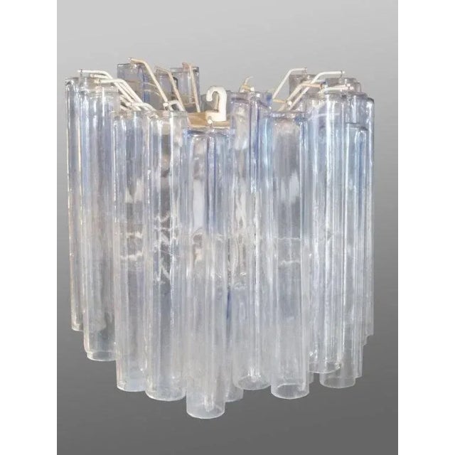 Italian glass entry pendant lamp by Venini, paper label Murano Venizia. Three tiers of hanging glass logs or " Tronchi " .