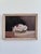 Set of two vintage original flower oil paintings showing floral still lifes in woven baskets, placed on a table against a...