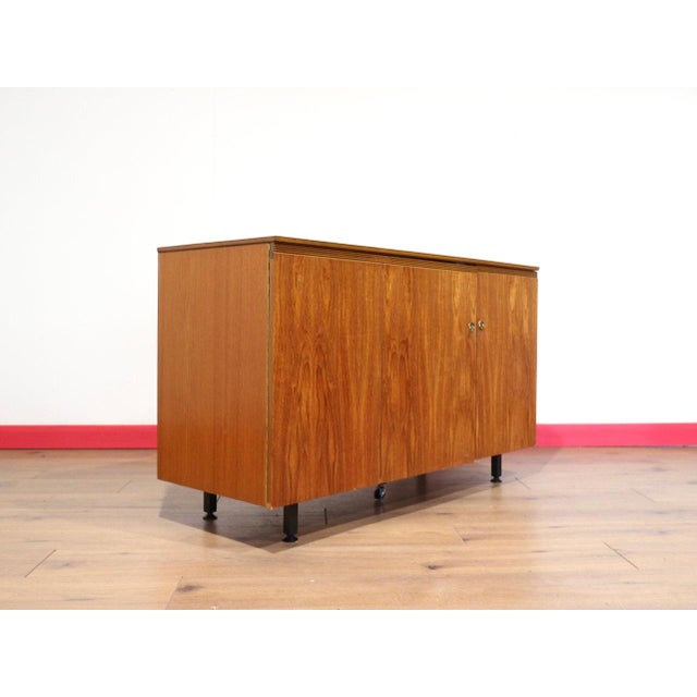 A beautiful spacesaving mid century desk, this Mid Century Modern Vintage Teak Metamorphic Box Desk Danish Style perfectly...