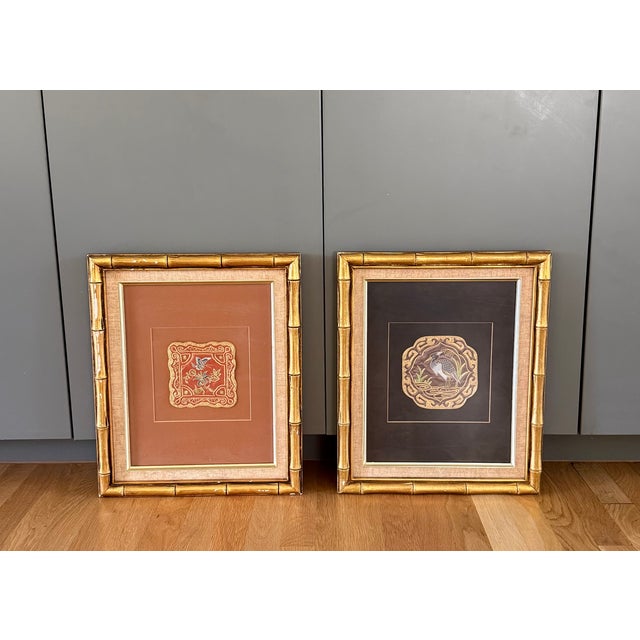 Pair of vintage framed 20th century Chinese hand embroidered silk mats or textile art framed in gold faux bamboo frames....