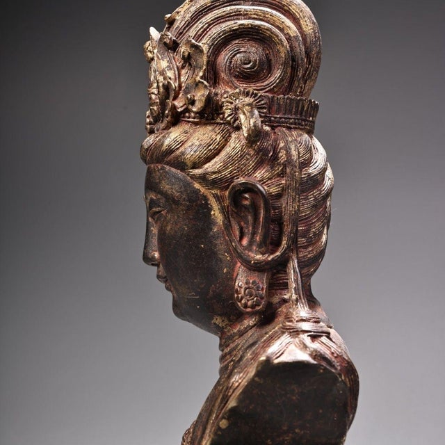 This is a stunning vintage Chinese Gilt Bronze Bust of Guanyin (The Bodhisattva of Compassion). This half-body sculpture...