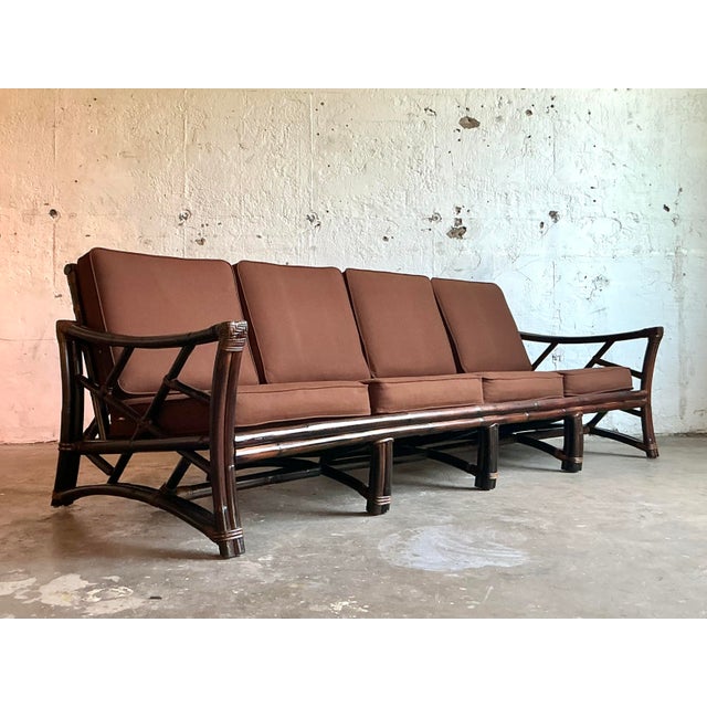 Embrace the timeless elegance of tropical modern design with this exceptional vintage slope-arm sofa. Crafted in the...