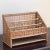 This small mid-20th century wood and cane is the perfect size to hold papers, mail and other small items on a desk,...
