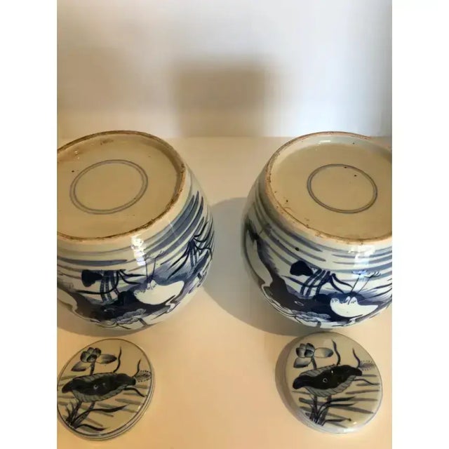 Pair of Mid 20th Century Blue and White Ginger Jars With Coastal Depictions of Cranes, Water and Shore Grass For Sale - Image 4 of 6