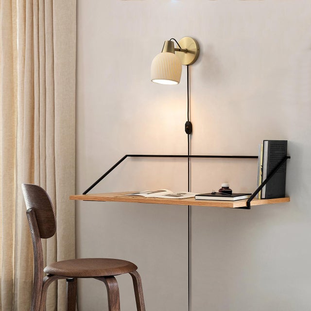 Blending handcrafted bone porcelain slip casting with refined metal detailing and innovative technology, the Petaluma Wall...