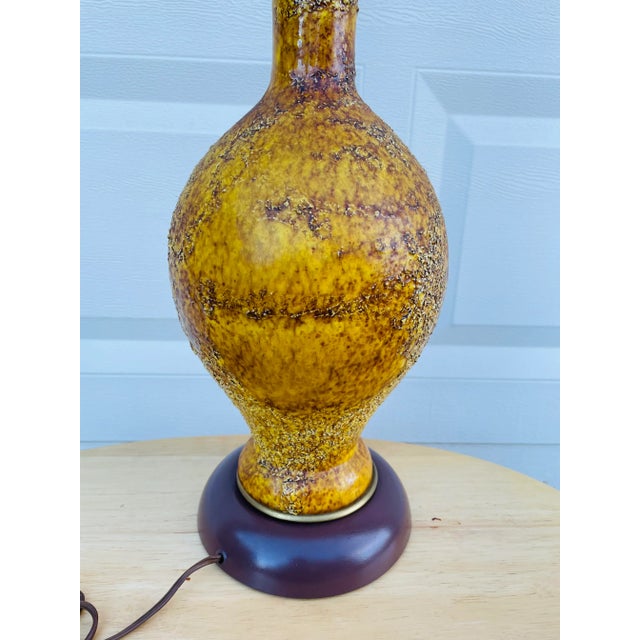 One of a kind unique mid century modern textured table lamp. Very tall piece with painted base and textured gold and brown...