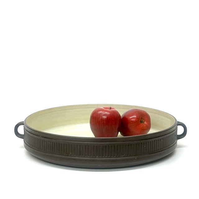 Large brown casserole dish. This is a gorgeous, rare, oversized 5.25-quart dark brown fluted Flamestone ceramic casserole...