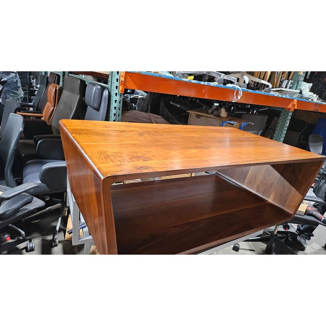 The Bernhardt Design Linc Coffee Table is a sculptural piece that showcases clean lines and organic form. Designed by...