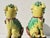 The classic pair of mother and father foo dogs on a high diapered throne. Tri-color: yellow, green, and brown. Each is "as...