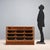 Special display unit with 12 drawer compartments, in oak wood and transparent glass. This piece is attributed to the...