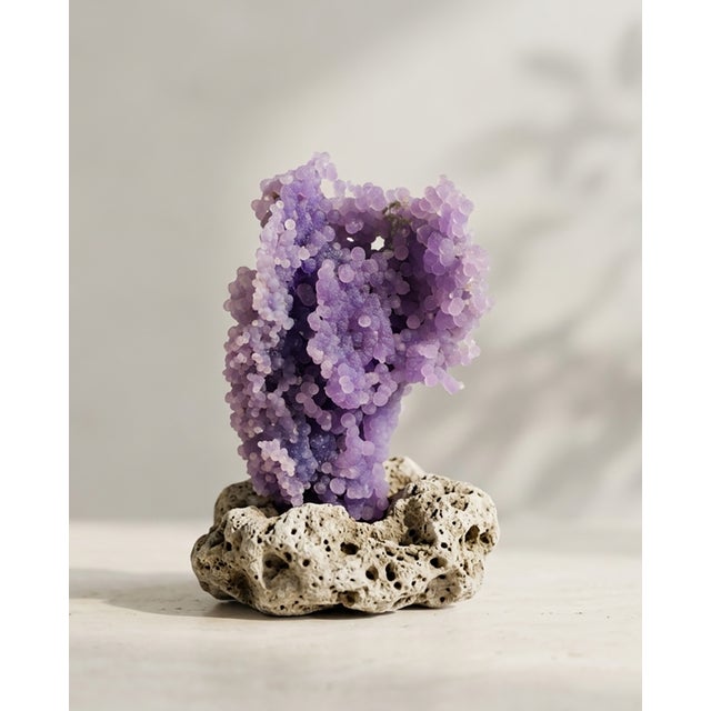 A sculptural natural Violet Grape Agate specimen selected for its soft purple tone, rounded botryoidal crystal formation,...