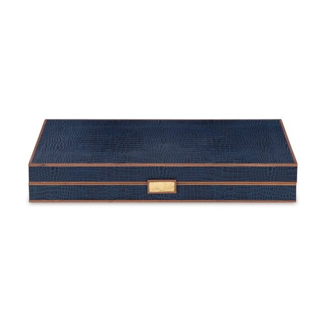 Navy croc leather backgammon game board with walnut trim and a cast brass handle. Interior is crafted of inlaid walnut,...