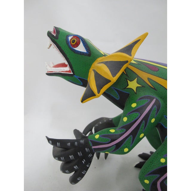 Large hand painted wood Lizard figure, made in Oaxaca, Mexico, traditionally known as Alebrije. Whimsical stylized iguana...
