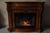 Twin Star International 62" Cherry Wood Empire Style Heater TV Stand Fireplace. Circa 21st Century, Pre-owned....