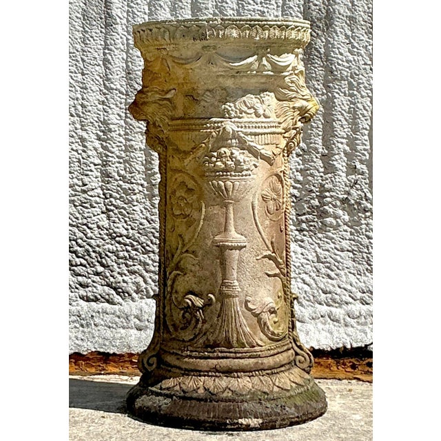 Elevate your space with this Vintage Regency Cast Cement Swag Pedestal, a striking piece that exudes classical elegance...