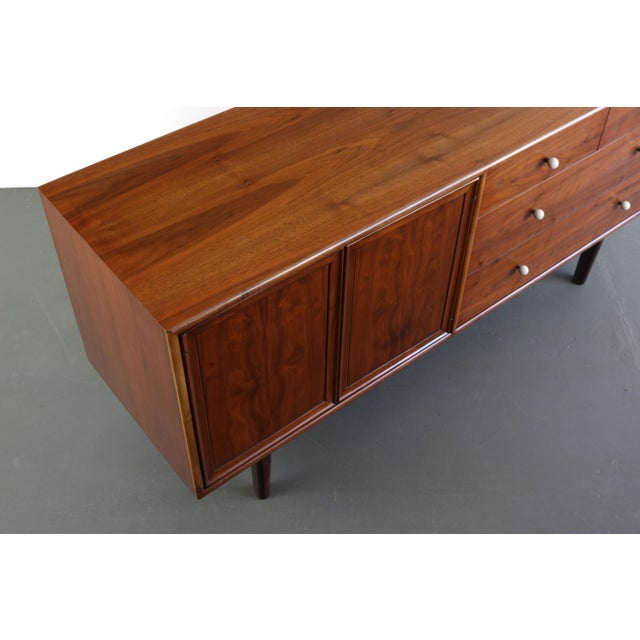 This beautiful american black walnut credenza is designed by Kipp Stewart for Drexel’s Declaration line. Classic, iconic...