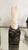 Vintage pair of carved stone horse head bookends with creamy white horse heads mounted on black stone cube bases. The...