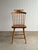 Vintage windsor-back valet chair with faux bamboo spindles, turned legs, and integrated valet bar. Light vintage wear. C....