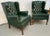 Striking Vintage Wing-Backed Tufted Chesterfield Lounge Chairs, a perfect blend of classic English design and bold,...