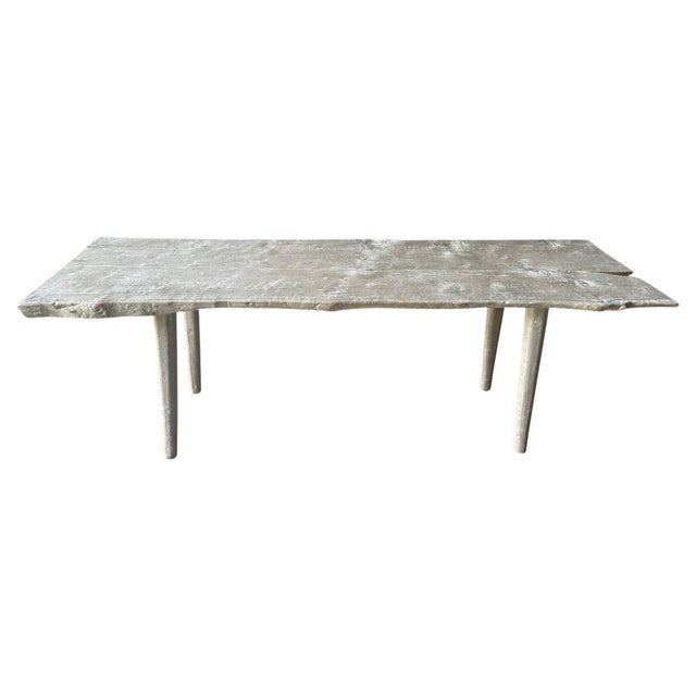 Two reclaimed thick teak panels are joined together to form this unique dining table. We first bleached the wood and added...
