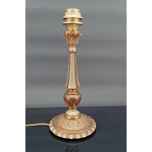 Lamp in green painted wood and copper patina. Art Deco. France, Circa 1920. In good condition, electricity OK. Dimensions:...