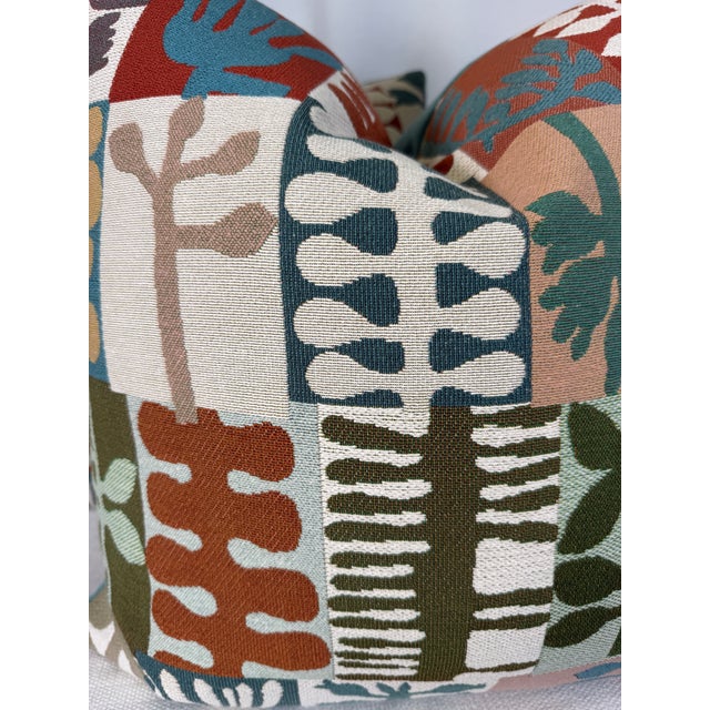 Custom pair of 22" pillows covered in Pierre Frey "Les Feuillages" in color fantaisie and backed in a coordinating velvet....