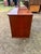 An elegant French Mid-Century Modern sideboard from the 1960s, showcasing clean architectural lines, tapered legs with...