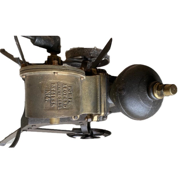 A French hand operated pump dating from the middle of the 19th century which was used in a winery to move wine or juice...