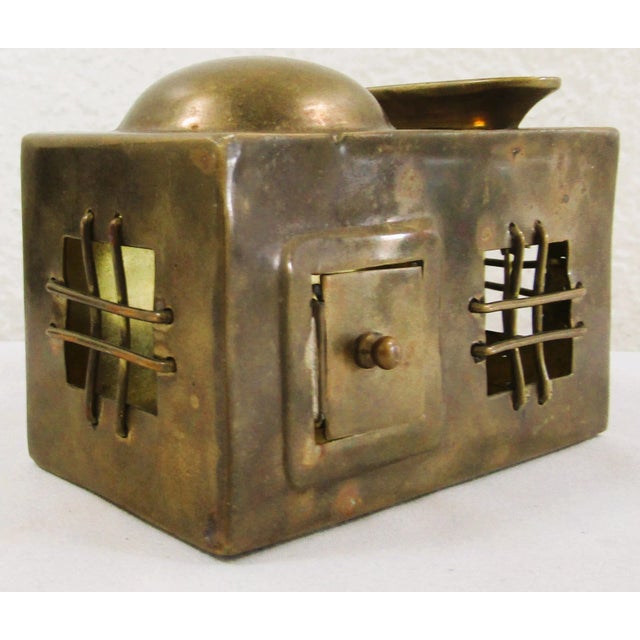 Mid 19th Century Persian Brass Tzedakah Charity Box Has a swinging door on the front. Etched on the reverse is "in the...