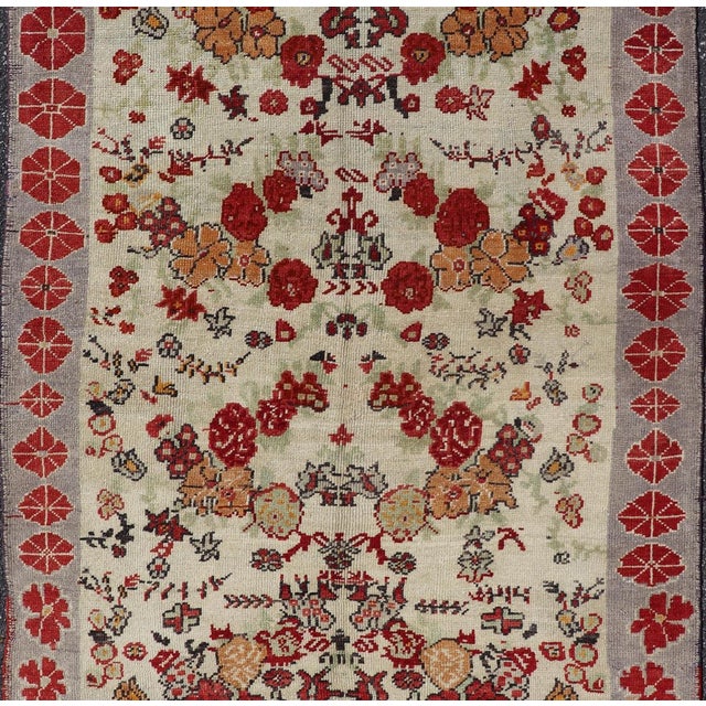 Vintage Turkish Oushak Rug in All-Over Flower Design Background & Simple Boteh Border For Sale - Image 10 of 13