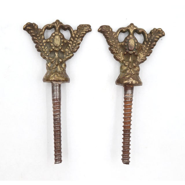 Victorian style mirror screws with a brass knob and a steel screw. Good condition with surface wear and rust from prior...
