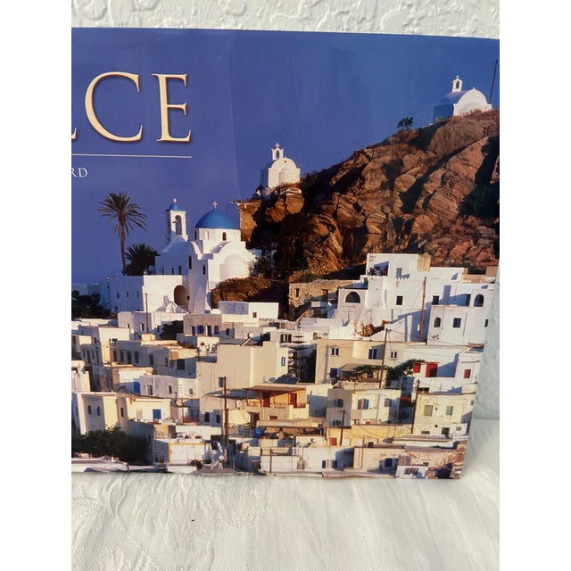 Beautiful 224 page hard cover book featuring vibrant photos along with background and historical information of Greece.