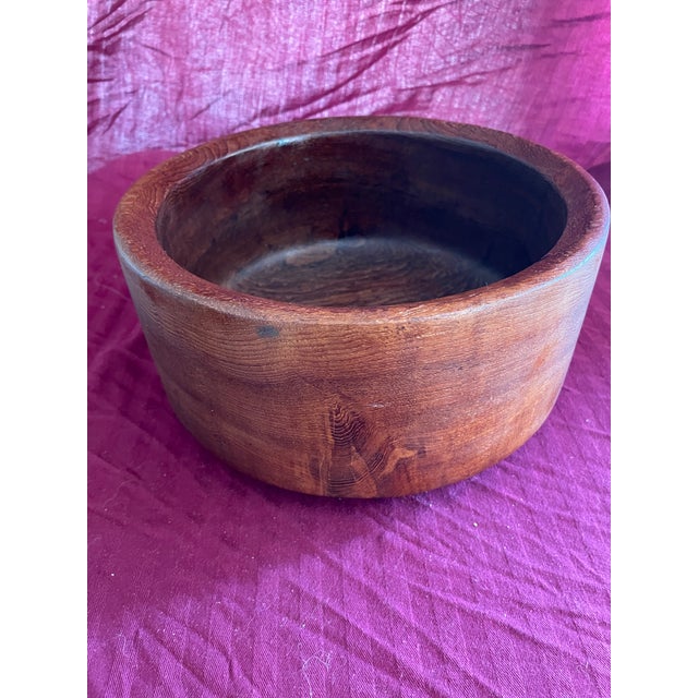 This is a gorgeous vintage modern solid wood bowl. Old growth wood shows beautiful burl. Light scratches on the bottom.
